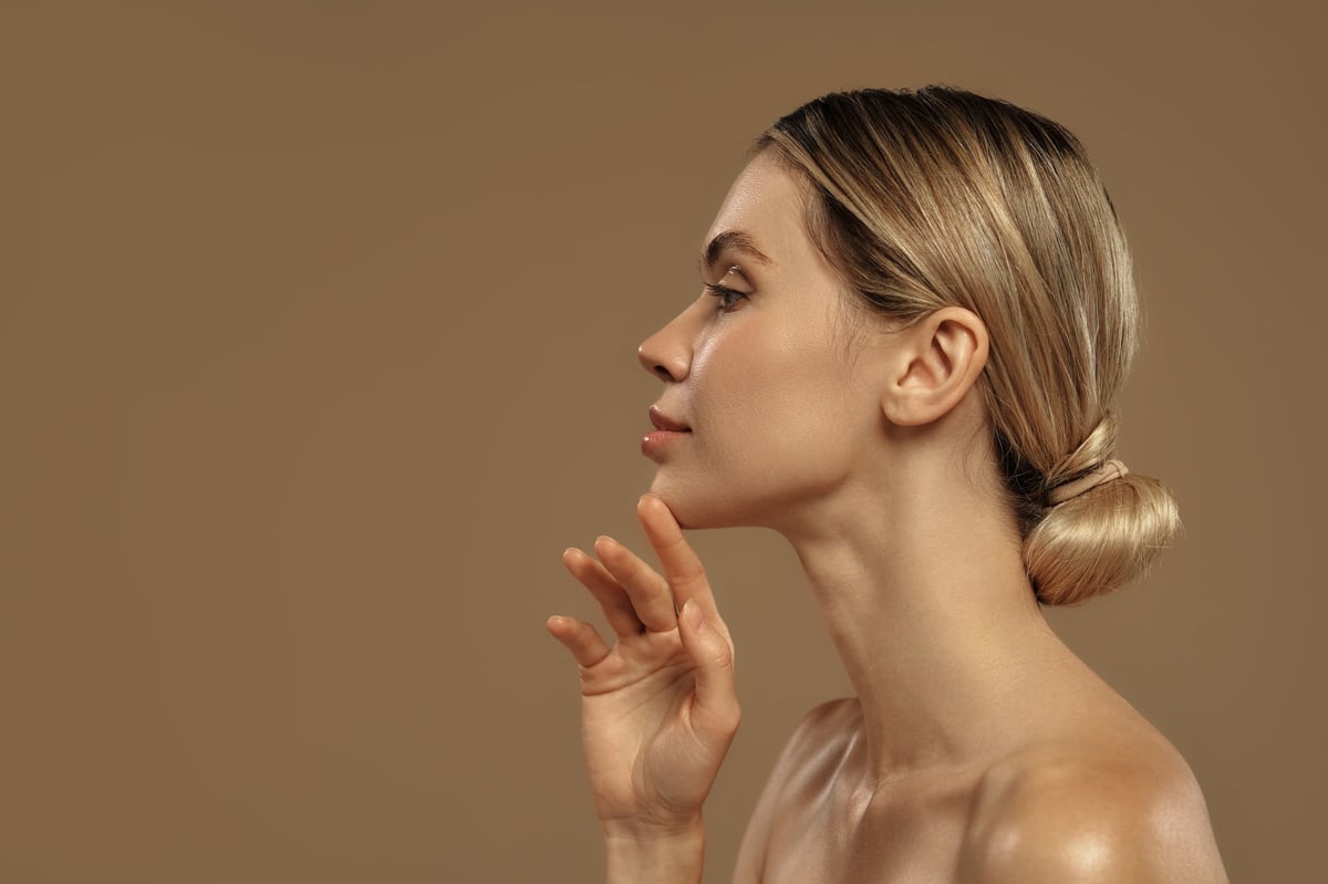 Elegant feminine face profile, facial harmony