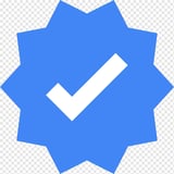 Blue star-shaped badge with white checkmark icon